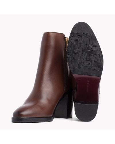 monogram embellishment block heel boots