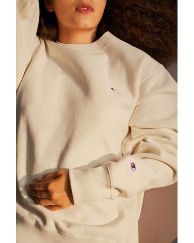 cream champion sweatshirt