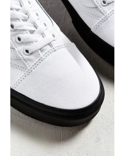 white vans with black bottom