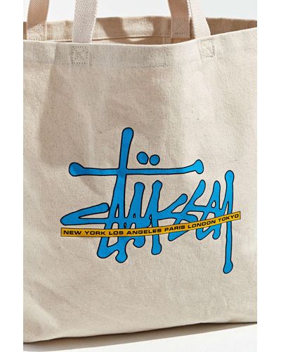 stussy world tour tote bolsa