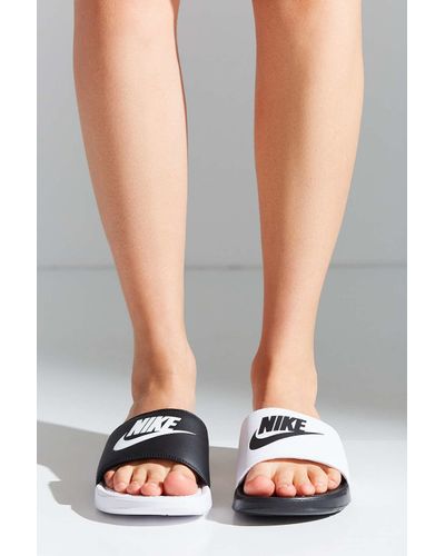 mismatch nike slides