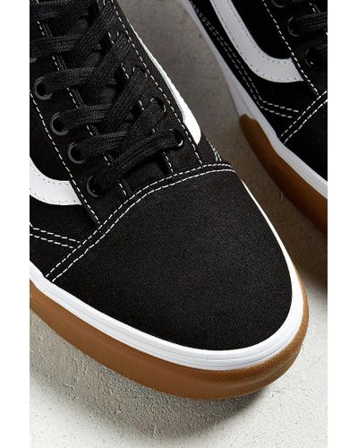 old skool vans black and white brown sole