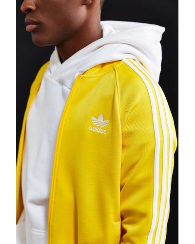 yellow adidas apparel