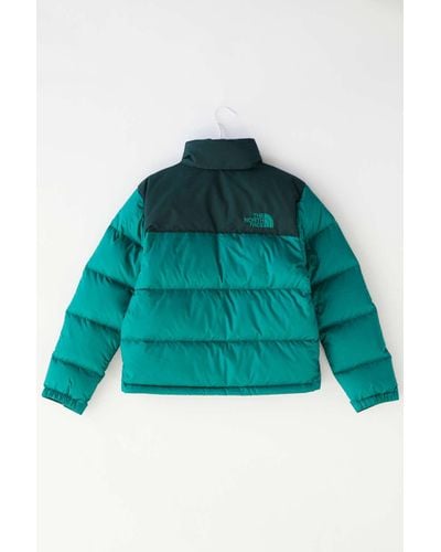 the north face green puffer jacket