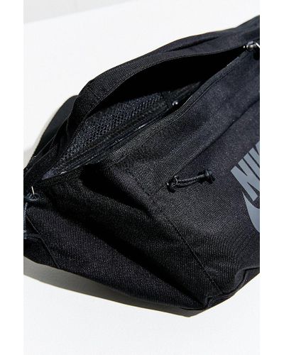 nike tech sling