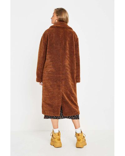 long tan teddy coat