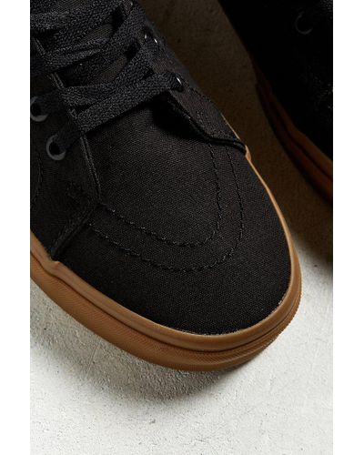 black high top vans brown sole
