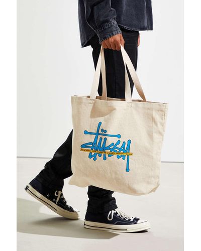 stussy world tour tote bolsa