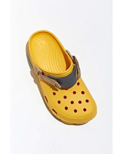 yellow all terrain crocs