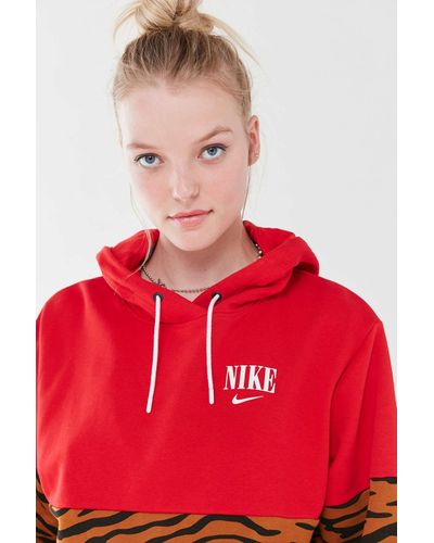 red nike animal print