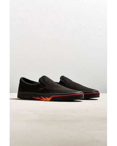 vans slip on flame wall