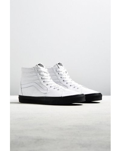 black in white vans