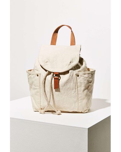 white canvas drawstring backpack