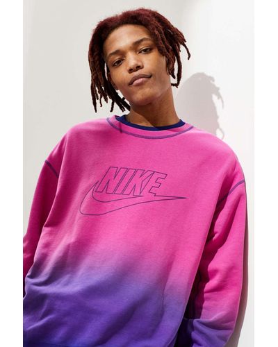 pink nike hoodie urban outfitters