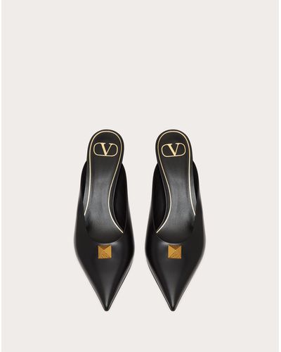 roman stud flat mule in calfskin