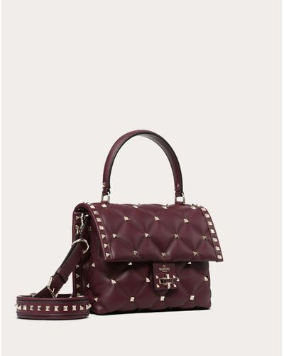 Valentino Leather Valentino Garavani Medium Candystud Top-handle Bag in  Ruby (Red) - Lyst
