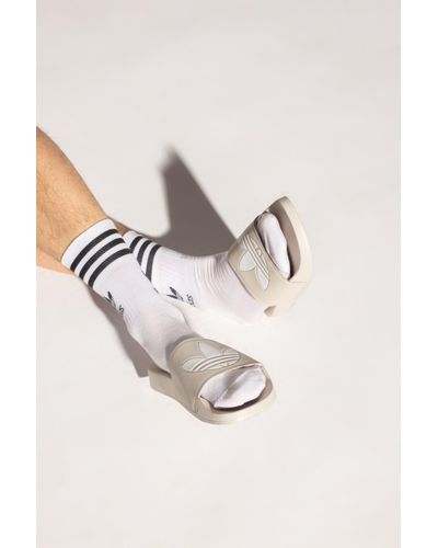 JUVENTUS AQUA ADILETTE SLIDES 2021/22 - Juventus Official Online Store