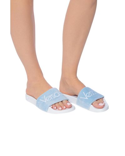 Versace Logo-embroidered Slides in Light Blue (Blue) - Lyst