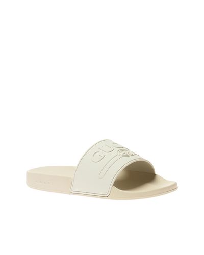cream gucci slides