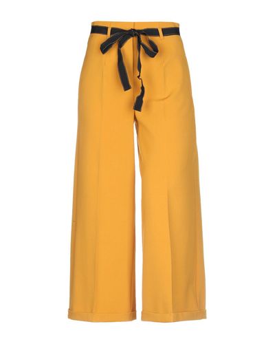 Beatrice B. Synthetic Casual Pants in Yellow - Lyst