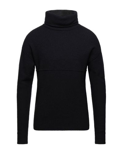 black coat and turtleneck