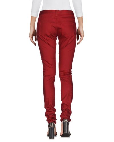 red denim pants