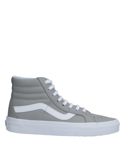 black and gray high top vans