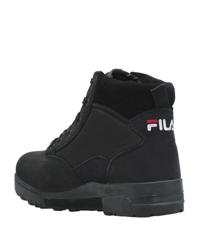 Botines de caña alta Fila de hombre de color Negro | Lyst