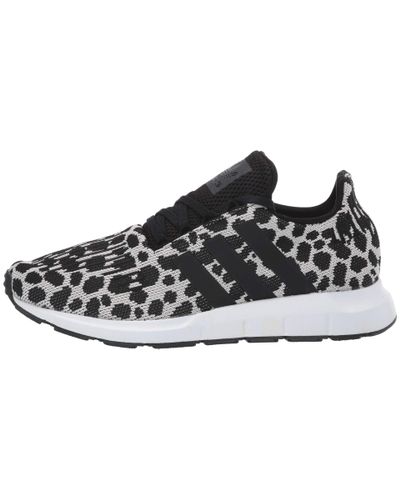 womens black and white adidas swift run