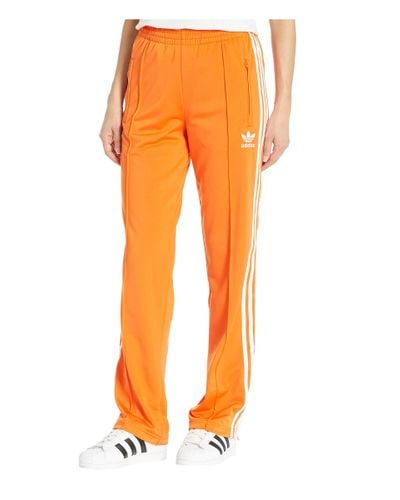 adidas Originals Synthetic Firebird Track Pants in Orange - Lyst
