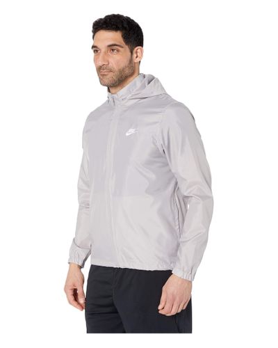 gray and white nike windbreaker