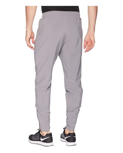 nike men's modern essential woven pants