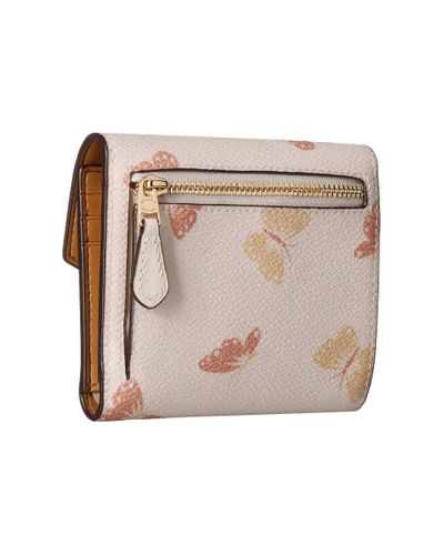 coach handbolsa with butterflies