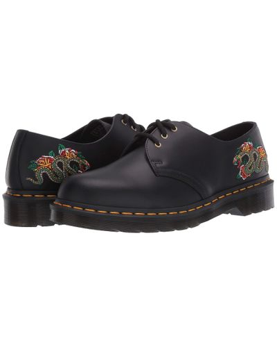 snake doc martens