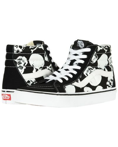 skull vans high tops