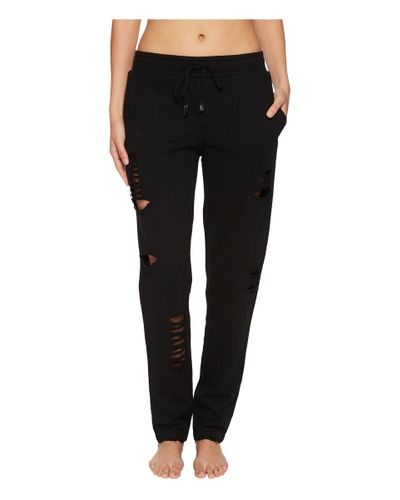 sweatpants with holes in knees