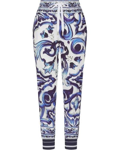 Dolce & Gabbana Pantalon de jogging Cady à imprimé majolique - Bleu