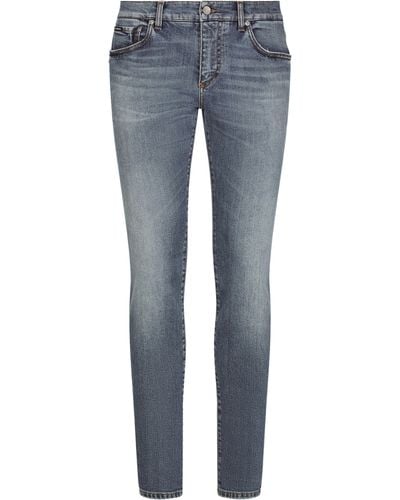 Dolce & Gabbana Hellblaue Stretch-Jeans in Skinny Fit mit Whiskering