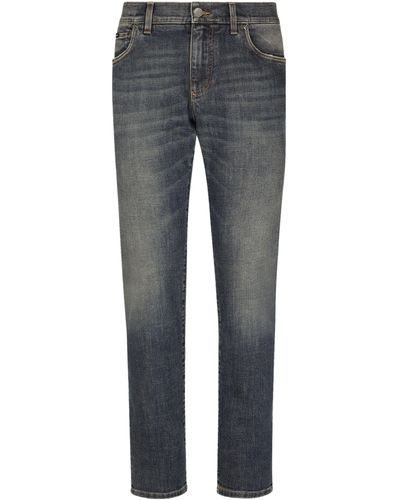 Dolce & Gabbana Stretch-Jeans Skinny aus hellblauem Washed-Denim - Grau
