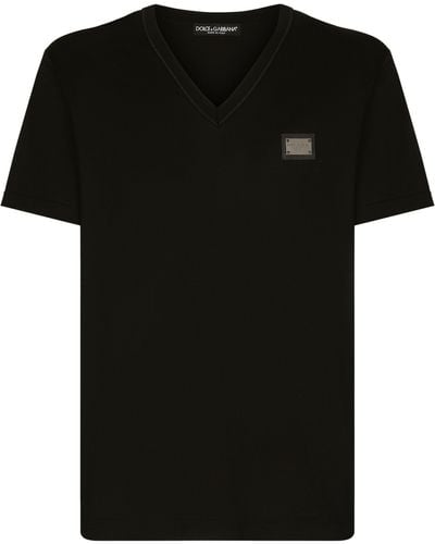Dolce & Gabbana Baumwoll-T-Shirt mit V-Ausschnitt und Branding-Tag - Schwarz