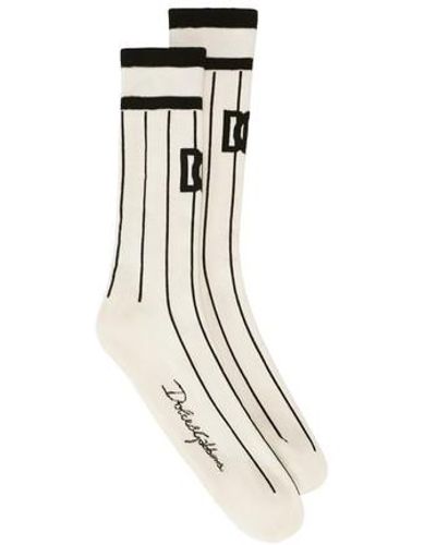 Dolce & Gabbana Gestreifte Jacquard-Socken aus Baumwolle mit Logo - Schwarz