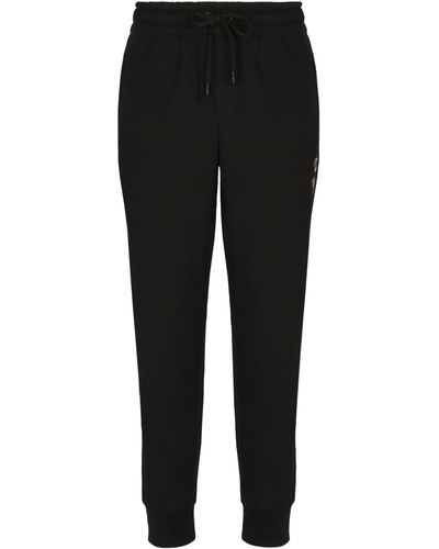 Dolce & Gabbana Pantalon de jogging en jersey à broderie - Noir