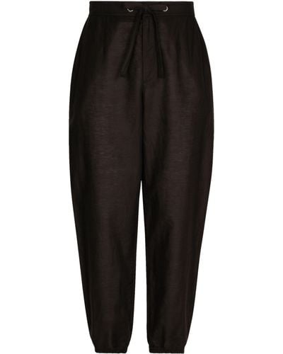 Dolce & Gabbana Pantalon de jogging en lin et coton avec étiquette logo - Noir