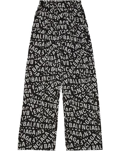 Balenciaga Weite Hose mit Logo-Print - Schwarz