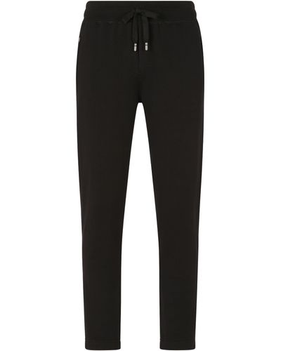 Dolce & Gabbana Pantalon de jogging en jersey avec plaquette à logo - Noir