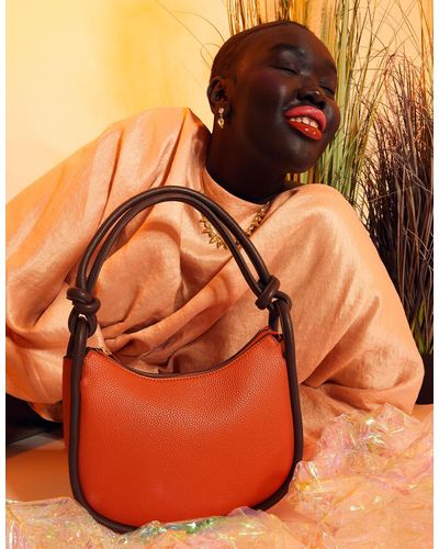 Accessorize Women's Orange Contemporary Contrast Piped Knot Shoulder Bag