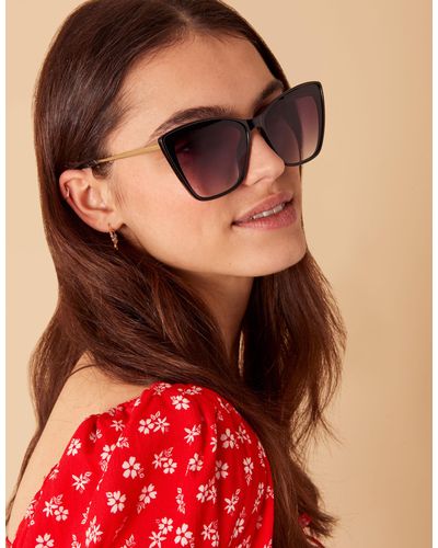 Accessorize Women's Black And Gold Thin Arm Cat Eye Sunglasses - Red
