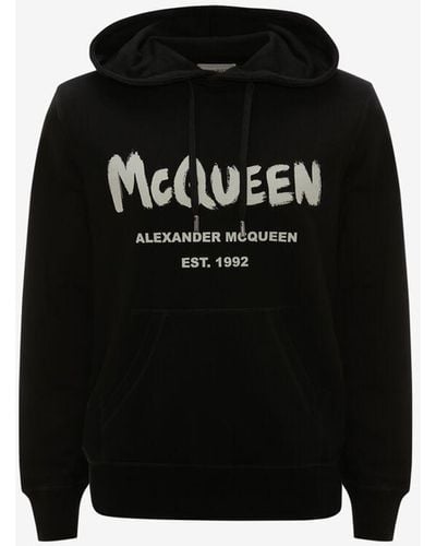 Alexander McQueen Kapuzensweatshirt mit mcqueen-graffiti-motiv - Schwarz