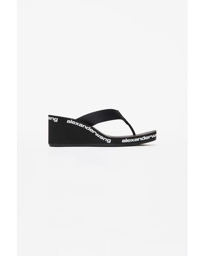 Black wedge flip flops uk sales