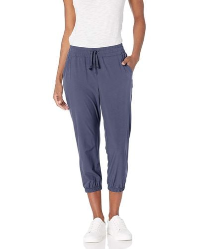 Amazon Essentials Pantalone Jogger Corto in Tessuto Elasticizzato Ad Alte Prestazioni Donna - Blu